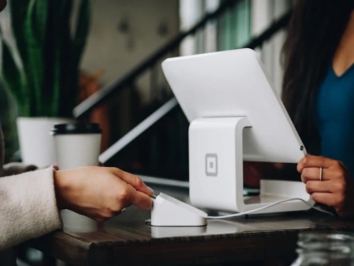 Telemarketing team running outbound calls alongside an AI voice agent dashboard