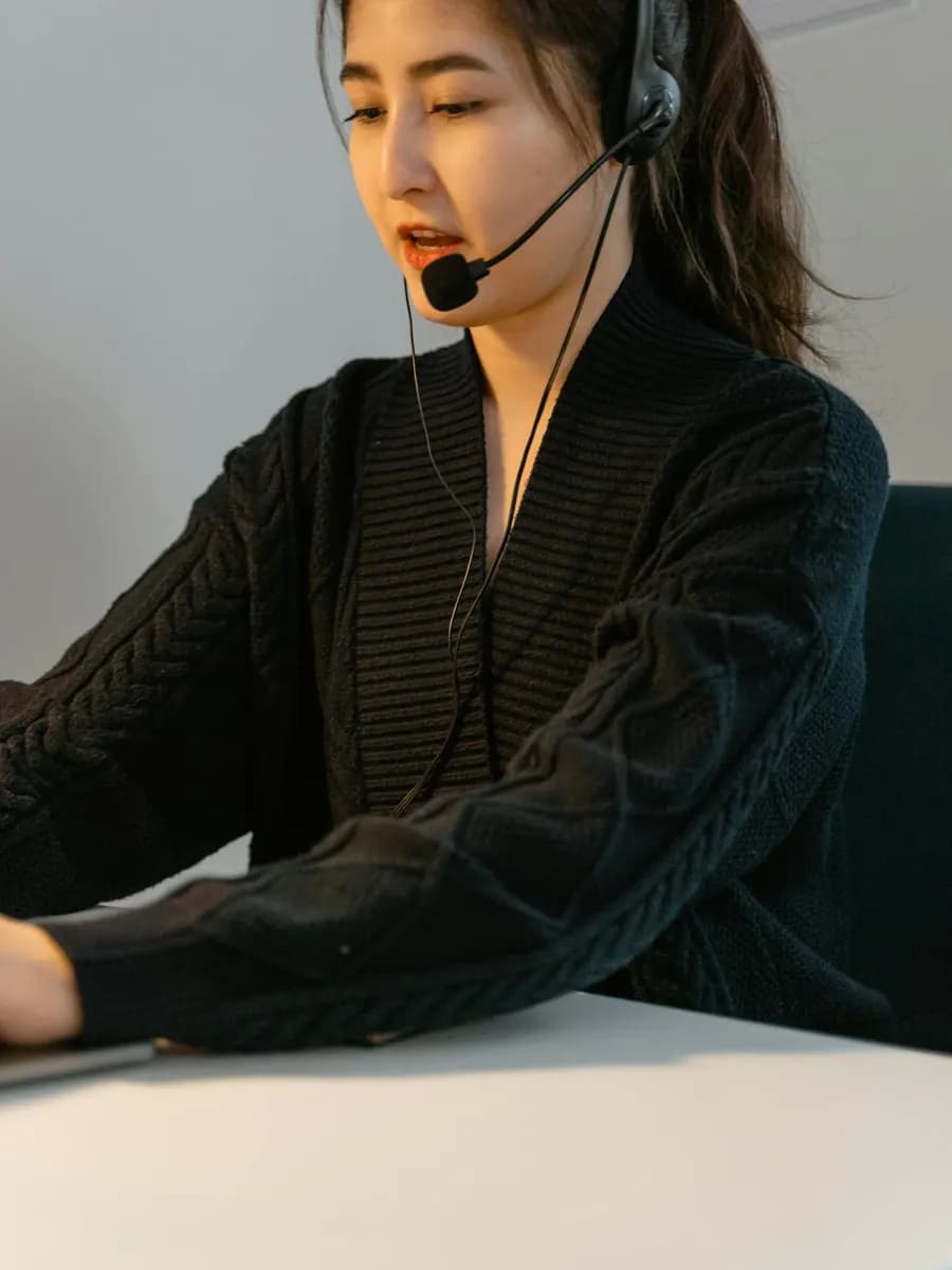 Woman wearing a headset while handling outbound sales calls